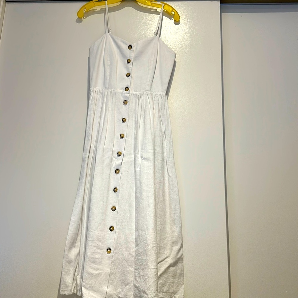 H&M white peasant style dress. Button in front. Size 4.